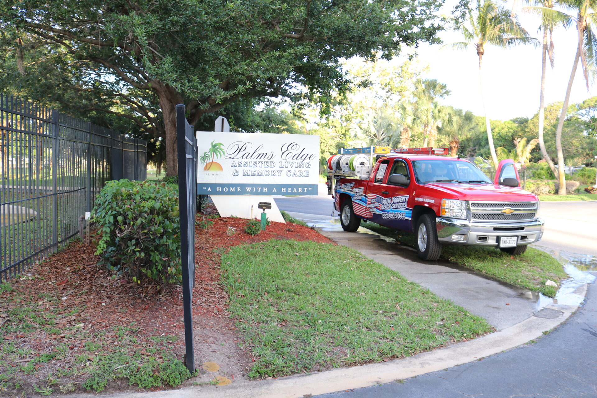 PBPS truck on-site at Palms Edge Assisted Living for HOA soft wash service